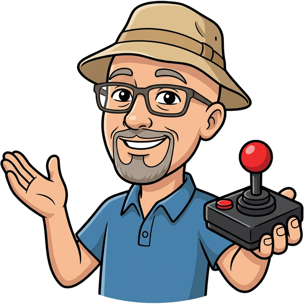 Scott, in his bucket hat, holding out an arcade joystick